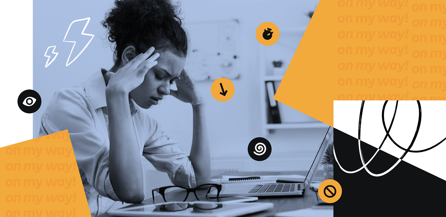 Photo of a woman at her laptop looking very stressed out